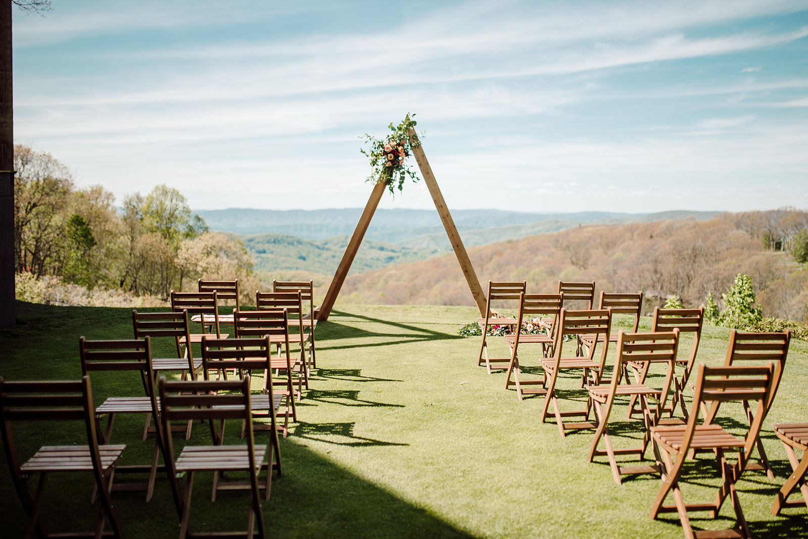 small wedding ceremony overlooking mountain